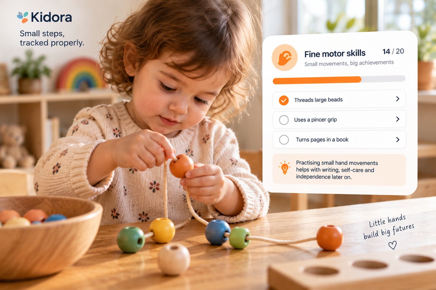 A toddler concentrates on threading a wooden bead onto a string at a table. A Kidora card shows a fine motor skills score of 14 out of 20 with threads large beads ticked.