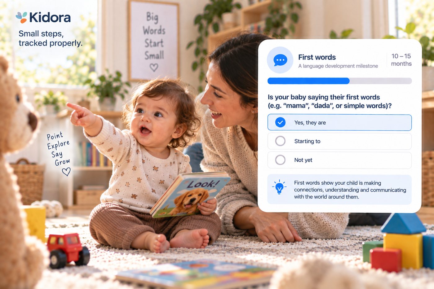 A toddler sits on a rug pointing at something off frame with her mouth open around a word while her mother follows the point. A Kidora card shows the first words milestone at 10 to 15 months.